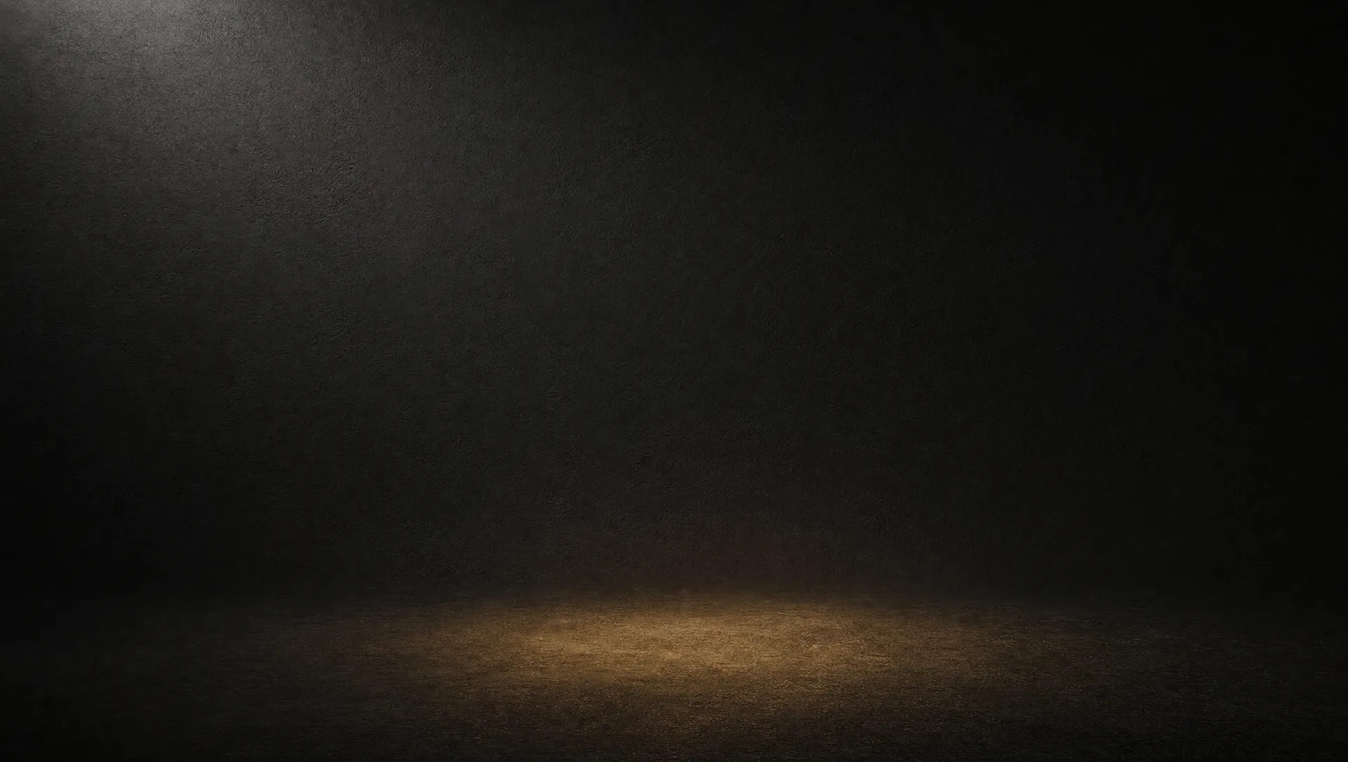 Fond de studio sombre éclairé par une lumière douce venant du haut à gauche